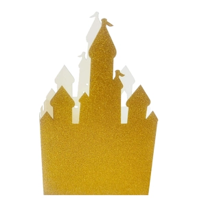 Detailed close-up of golden glitter castle candy box with intricate hollow design