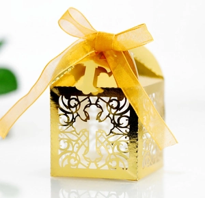 Elegant gold laser-cut hollow cross candy box with ribbon for wedding party favors