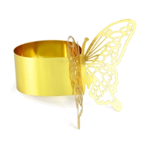 Detail showing high-grade golden metal butterfly napkin ring with hollowed-out design