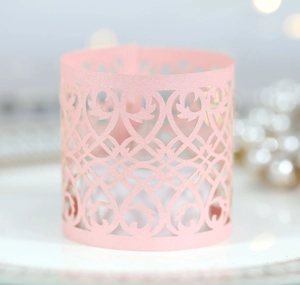 Pink pearl paper laser-cut tea light candle wrap with elegant baroque scroll pattern