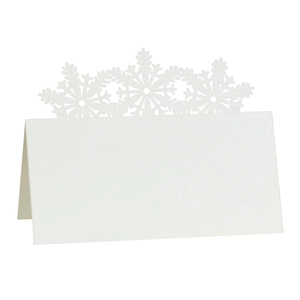 Detailed laser-cut snowflake hollow pattern on pure white festive table place card