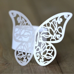 Elegant white laser-cut butterfly napkin ring for wedding and banquet table decoration
