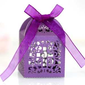 Purple hollow-out wedding candy box with laser-cut cross design and satin ribbon bow
