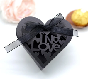 Elegant heart laser-cut gift box in black with ribbon for wedding and romantic events