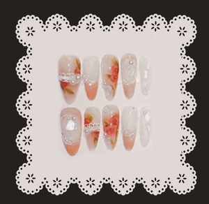 Press-on nails with red roses lace patterns and white pearls on elegant display card