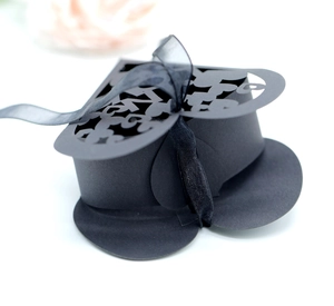 Detail of laser-cut heart hollow design on black matte cardstock wedding favor box