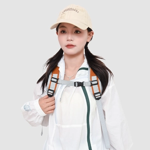 Detail of adjustable chest straps and padded grey shoulder straps on large backpack