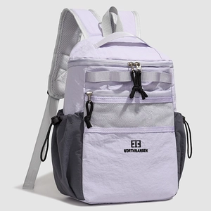 Detailed front view of the purple and grey backpack featuring a functional mesh zipper pocket