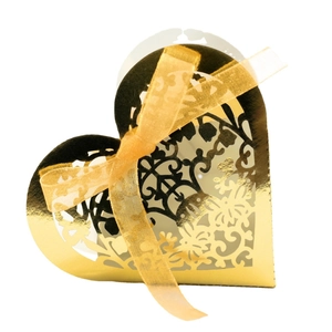 Golden heart-shaped laser-cut favor box with organza ribbon for weddings and gifts