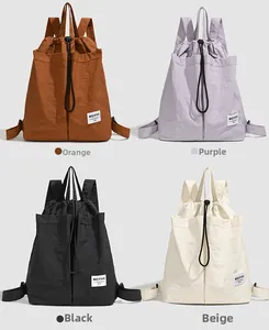 Waterproof drawstring backpack shown in orange, purple, black, and beige color options