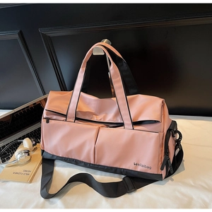 Sac de sport rose et noir avec séparation sec-humide et tissu en nylon imperméable