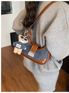 Retro crescent moon denim shoulder bag with leather trim and cute bear charm detail