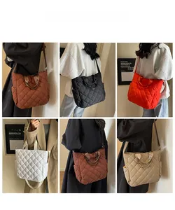 Detailed views of large quilted tote bags in five colors with side pockets and straps