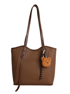 Vintage brown leather tote bag with teddy bear pendant and gold fashion lettering