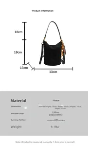 Tableau des tailles détaillé pour sac seau en polaire noire avec mesures des anses