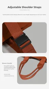 Detail of adjustable shoulder strap with buckle and thickened woven handle in orange-brown