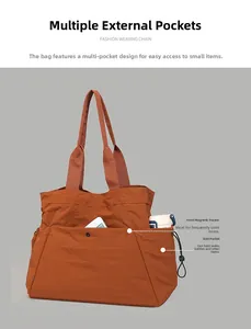Detail showing the large front pocket with magnetic snap and side drawstring bottle bag