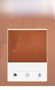 Close-up of water-resistant brown nylon fabric showing hydrophobic water droplets on surface