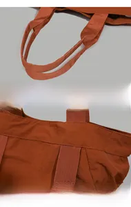 Close-up of woven handles and precision stitching on water-resistant nylon tote bag