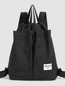 Large capacity black nylon drawstring backpack with two front pockets for daily commuting