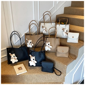 Detailed display of vintage leather tote and mini square bags in black, coffee, and beige colors