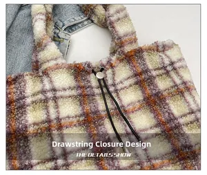 Detail of checkered plush tote bag featuring drawstring closure and metallic toggle