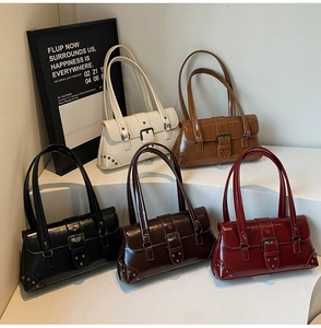 Detailed close-up of retro baguette shoulder bags in five colors with metallic buckles