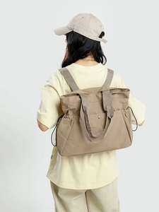 Beige waterproof large capacity backpack and handbag for women commute and college use