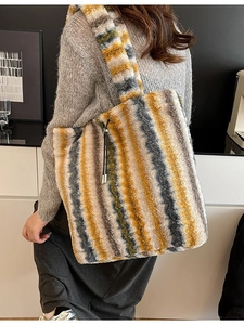 Plush faux fur tote bag with yellow and grey stripes, soft fluffy winter shoulder handbag