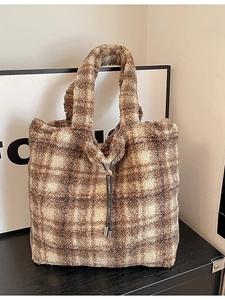 Brown and beige plaid faux fur tote bag with plush texture and adjustable drawstring handles