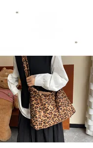 Detail view of leopard print tote bag with soft texture and adjustable canvas shoulder strap