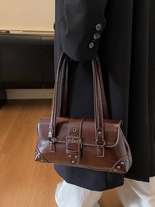 Retro brown high-gloss leather shoulder bag with buckle detail and silver studs