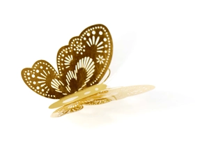 Detailed close-up of a 3D rose gold hollow butterfly wall sticker with laser-cut patterns