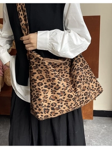 Large leopard print crossbody tote bag with wide strap for versatile daily wear