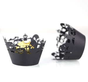 Laser-cut black Halloween cupcake wrappers featuring spooky pumpkin and bat designs