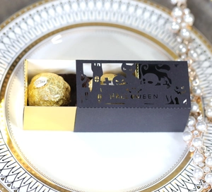 Hollow Halloween chocolate box with black pumpkin cat design and golden inner tray