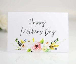 Close-up of Mother's Day card with watercolor roses and Happy Mother's Day text