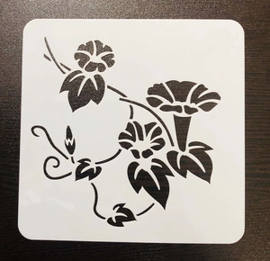 Macro detail of PET stencil featuring intricate hollowed morning glory floral patterns