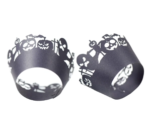 Halloween black cupcake wrappers with laser-cut pumpkin, bat, and ghost silhouettes