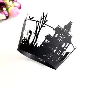 Halloween black lace cupcake wrappers with laser-cut haunted castle and pumpkin designs