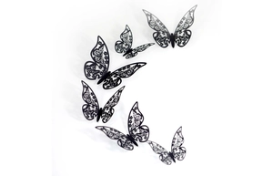 Detailed laser-cut hollow patterns on 3D black butterfly wall stickers set