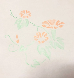 Laser-cut PET drawing template featuring orange flower and green leaf stencils for kids