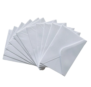 Fan-shaped arrangement of premium white envelopes for wedding cards and invitations