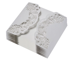 Laser cut hollow wedding invitations made of white pearlescent paper with floral pattern