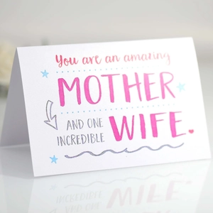 Elegant Mother's Day card for wife with floral typography on a reflective surface