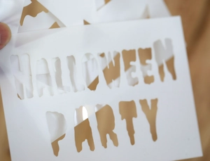Detail of Halloween Party lettering on a PET hollow painting template for DIY decor