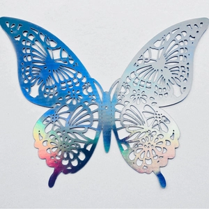 Holographic 3D butterfly wall stickers with intricate laser-cut hollow floral patterns