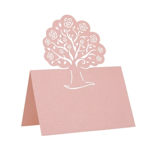 Pink laser-cut rose tree place cards in pearlescent paper for weddings and events