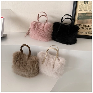 Detailed display of fuzzy plush handbags in pink, black, coffee, and creamy white colors