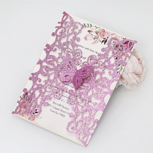 Detailed laser-cut butterfly wedding invitation card with pink floral inner page